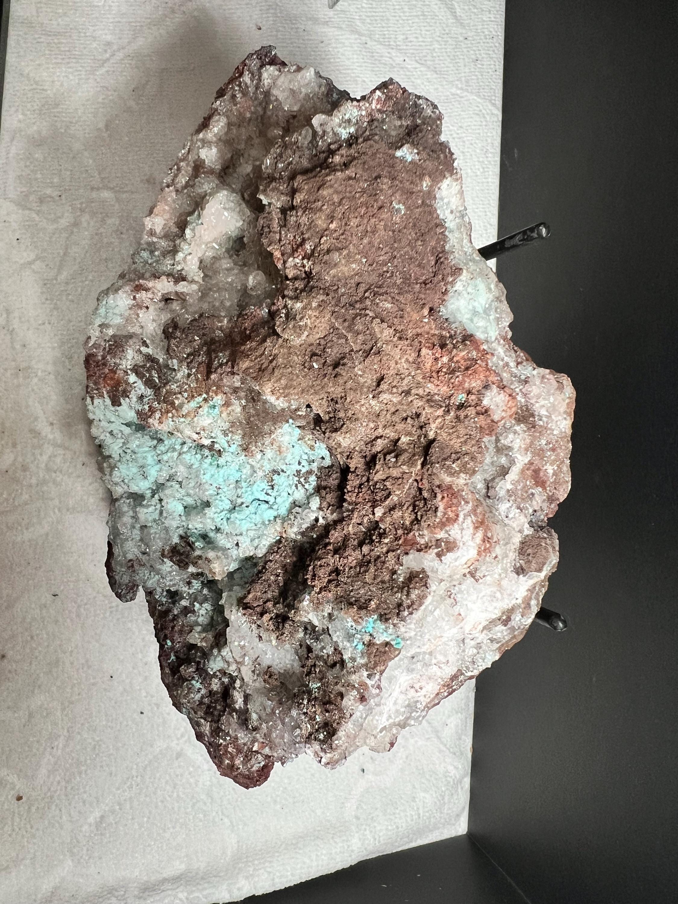 Aurichalcite with calcite and chrysacolla from Mexico.