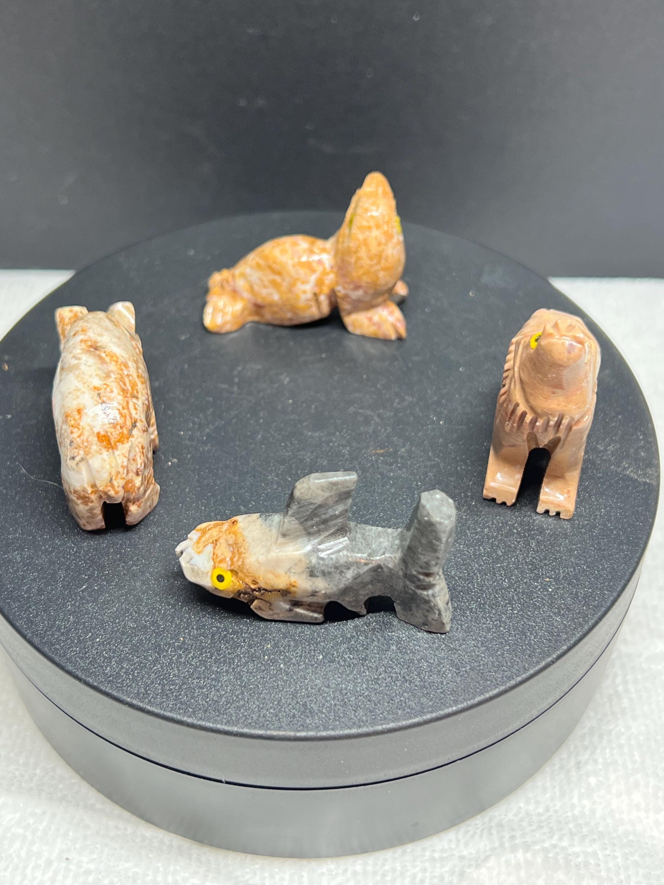 Carved animals, set of 4.