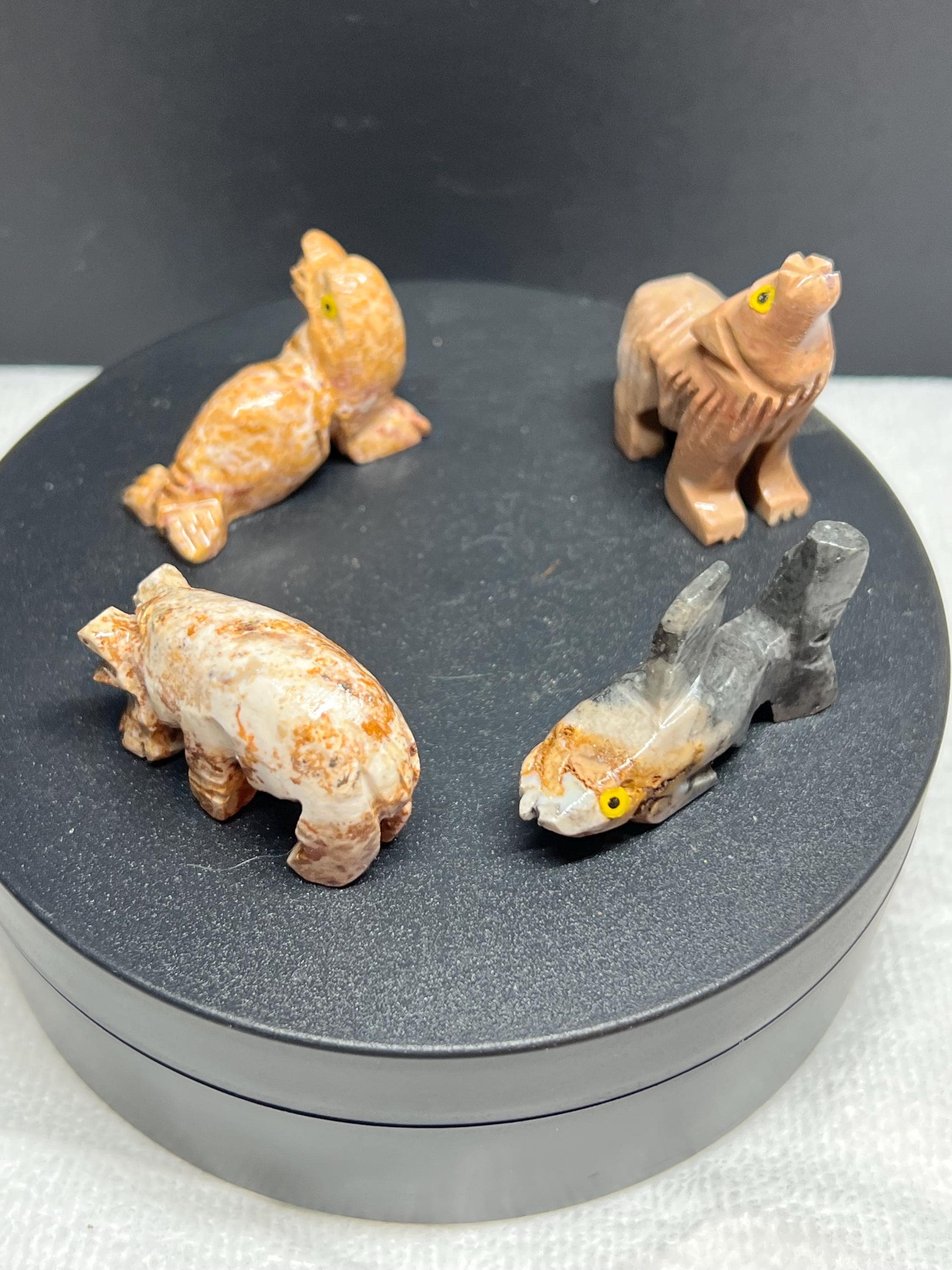 Carved animals, set of 4.
