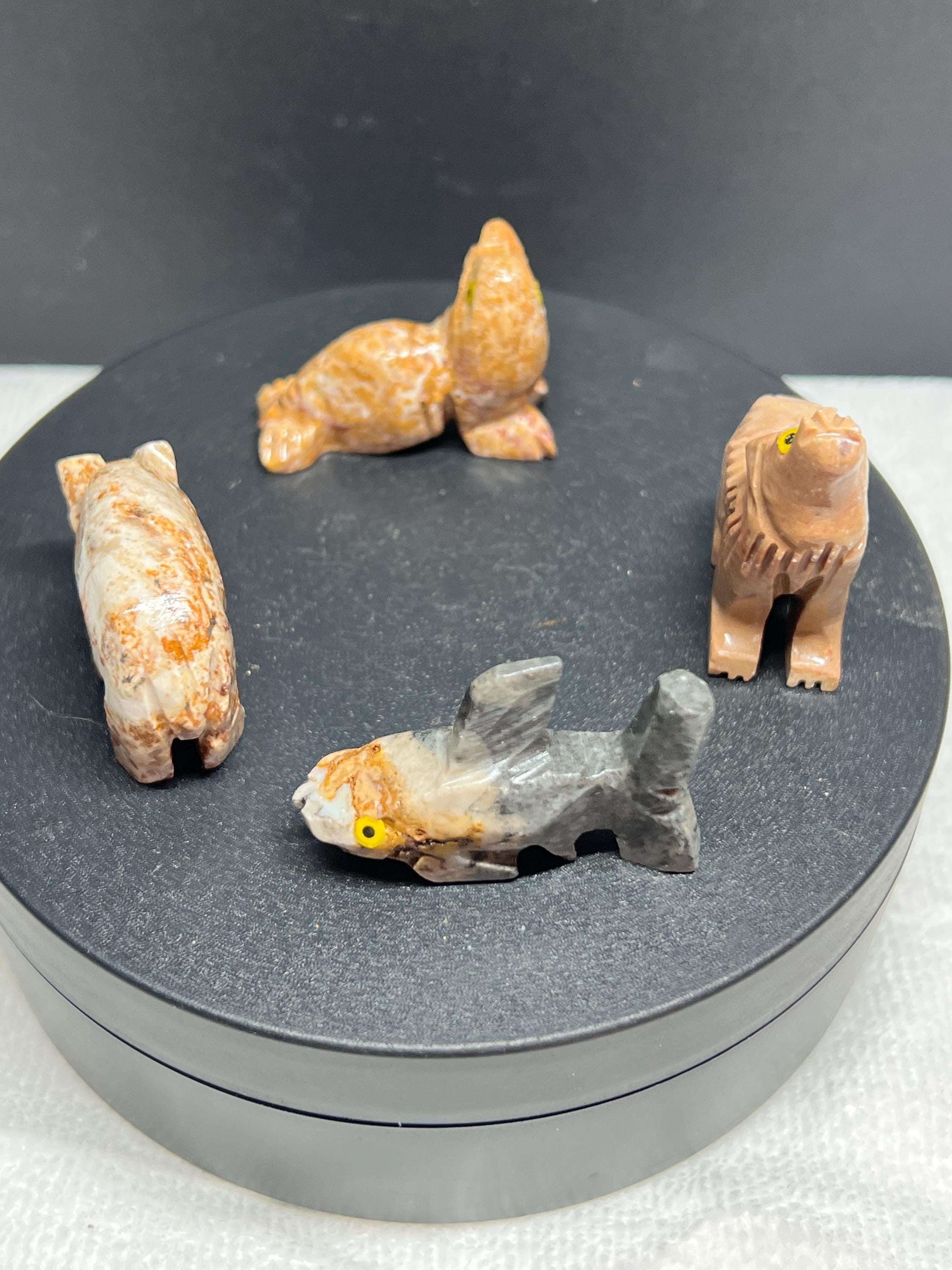 Carved animals, set of 4.