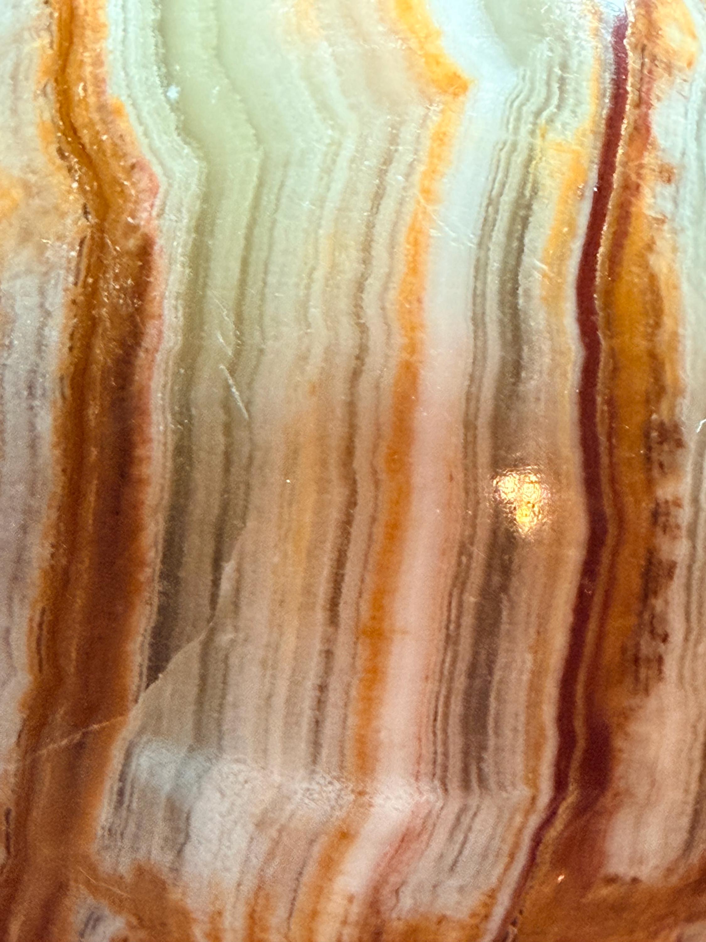 Banded Onyx/calcite egg. UV reactive.