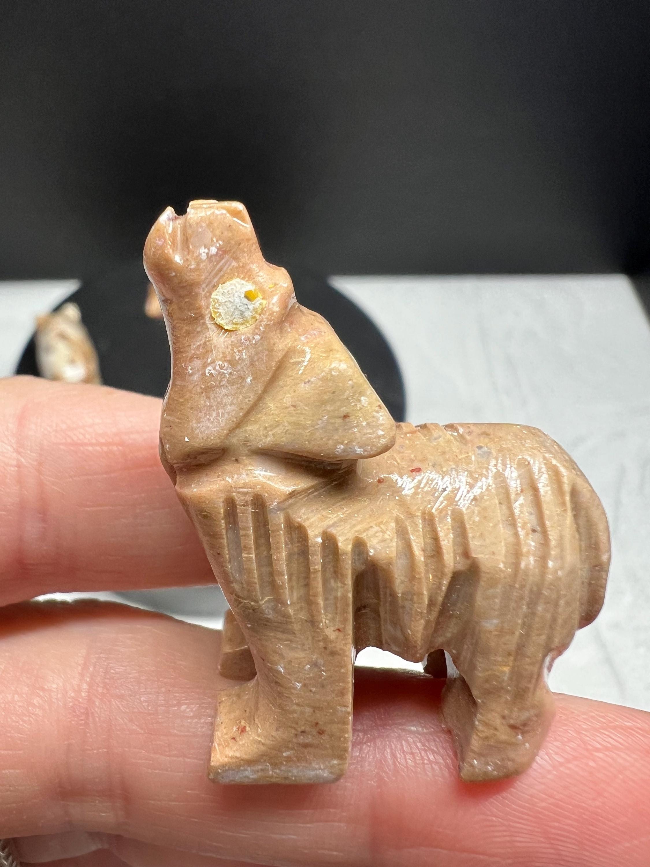 Carved animals, set of 4.