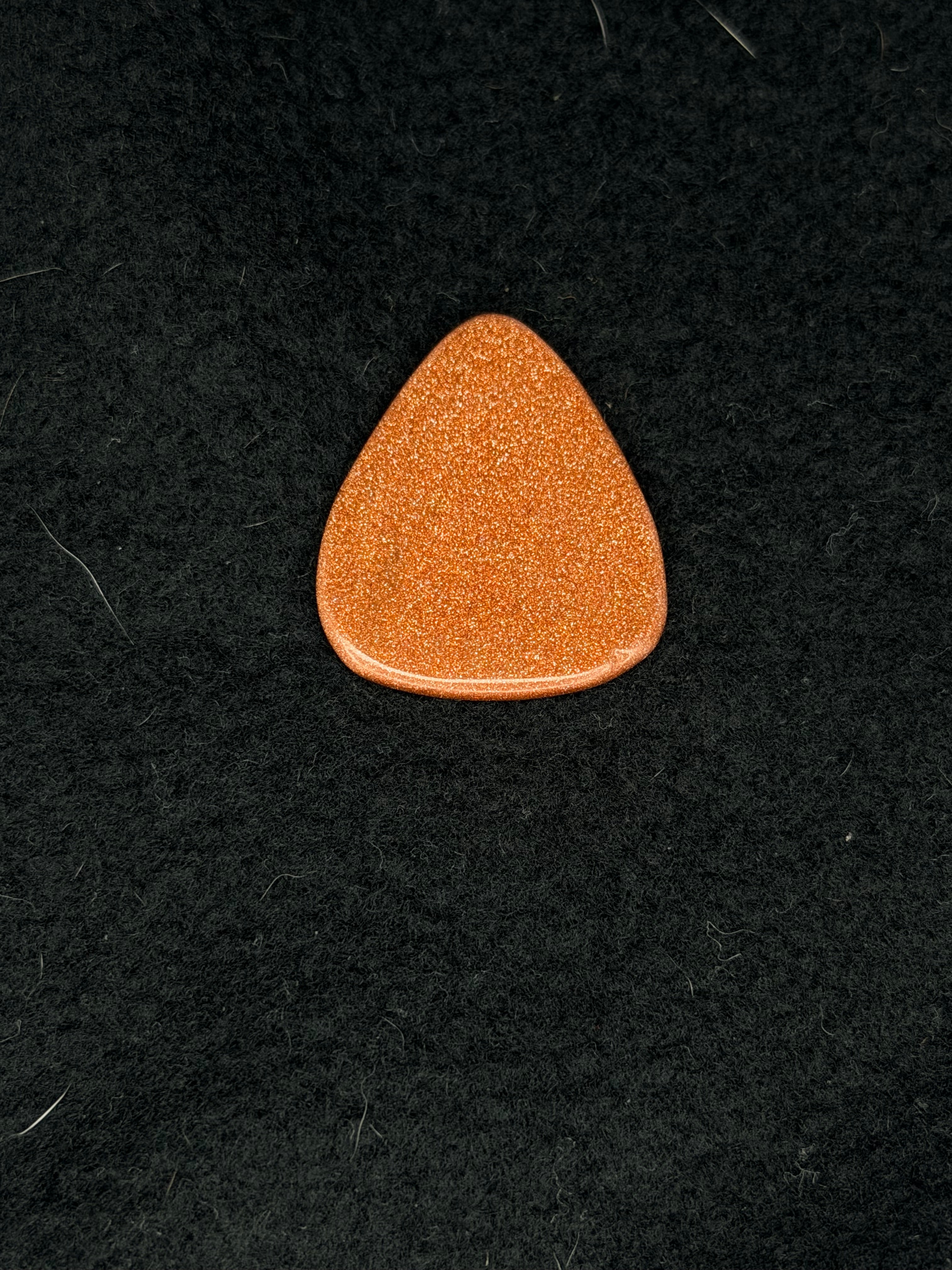 Goldstone guitar pick