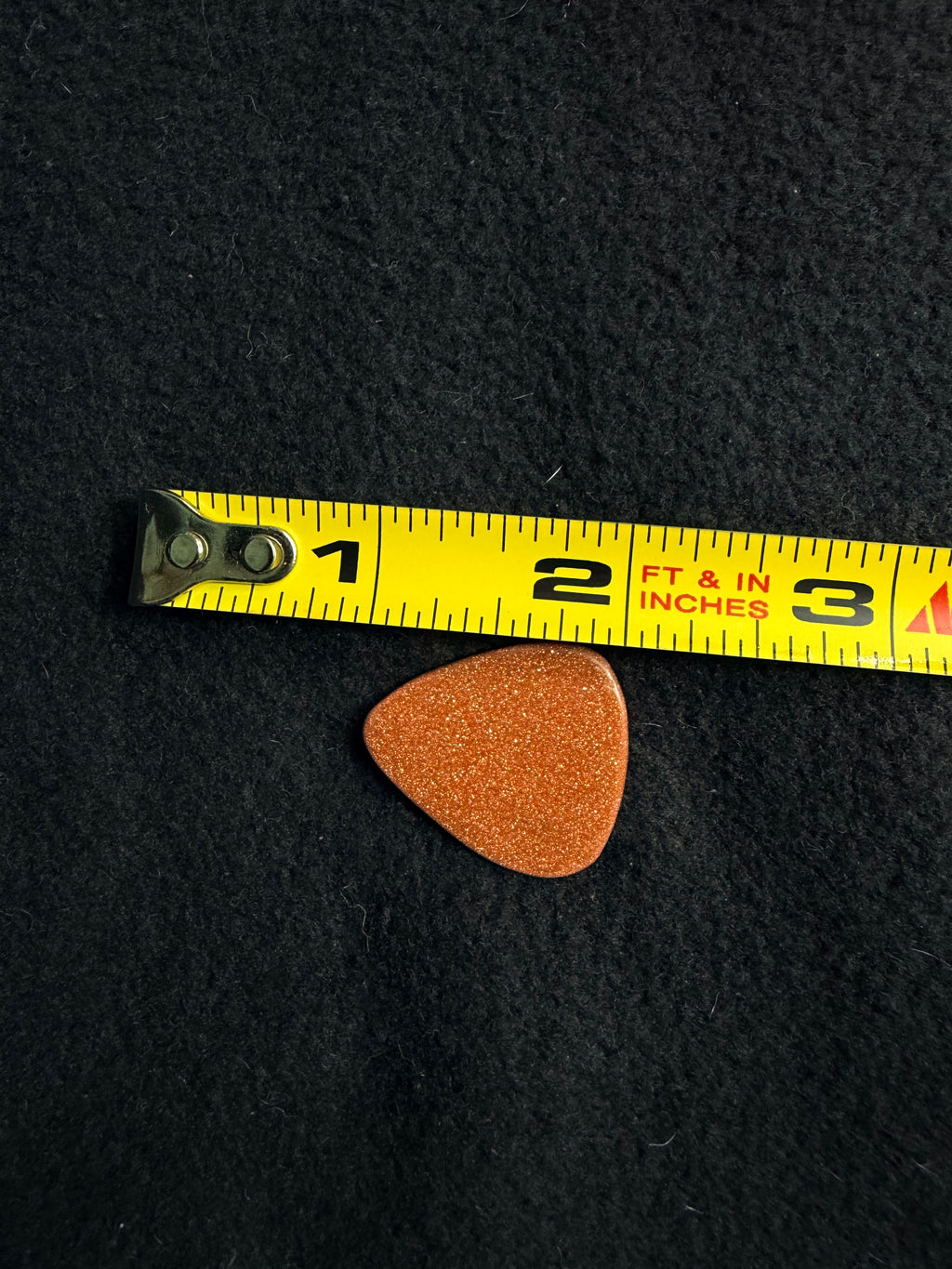 Goldstone guitar pick