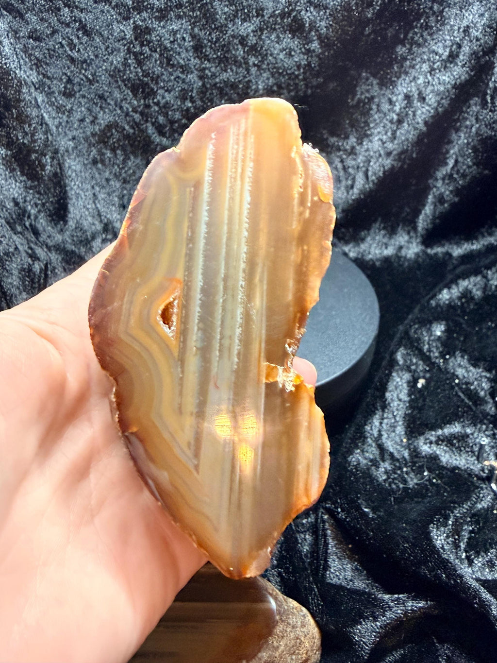 Polished Brazilian water level agate with crystal pocket