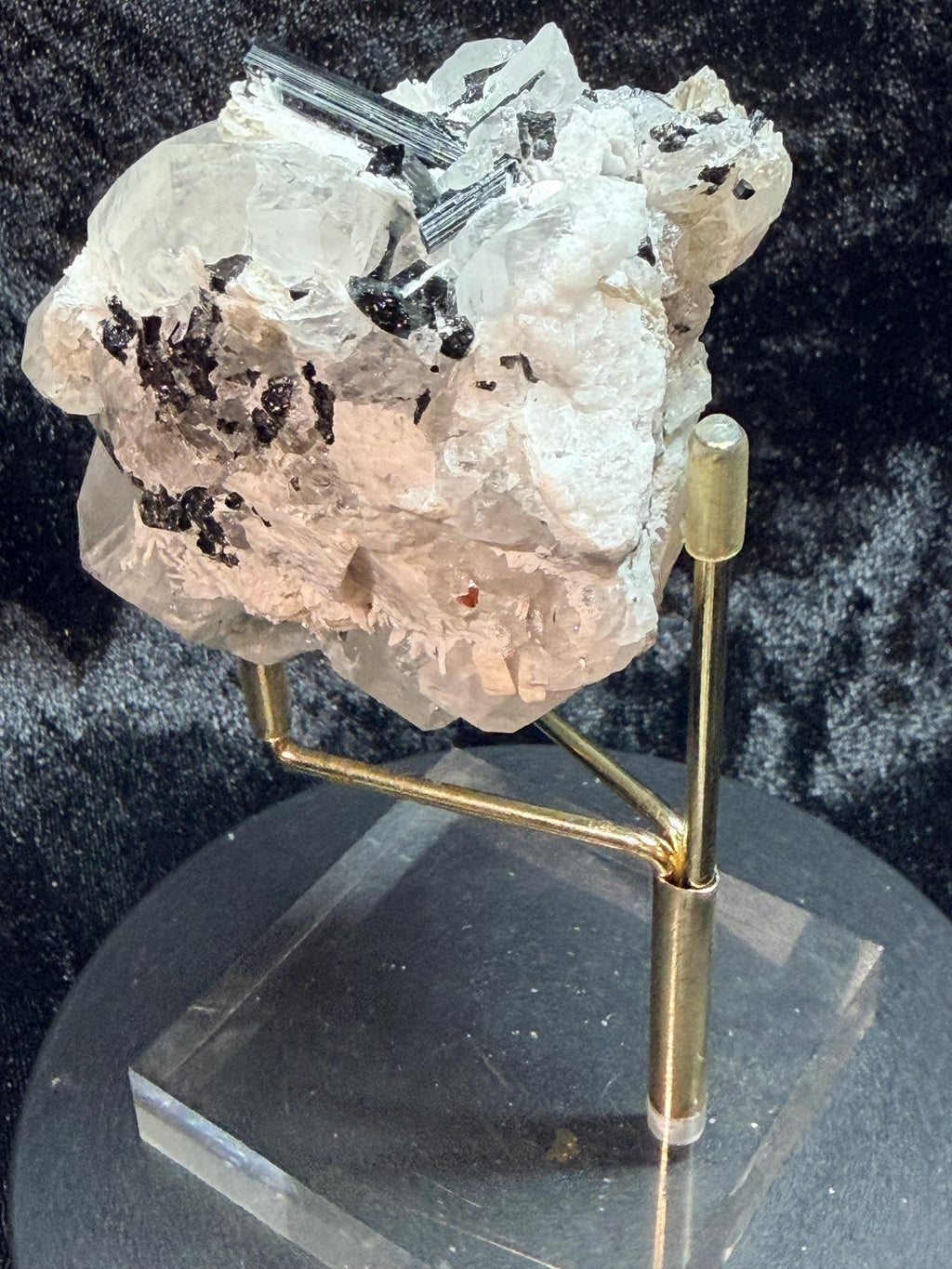 Blue and black tourmaline on quartz with calcite and Muscovite