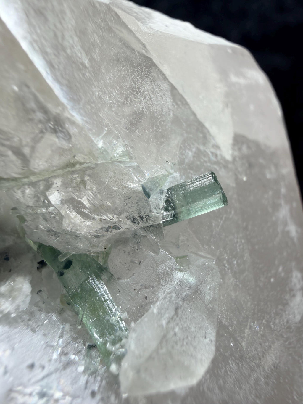Blue and black tourmaline on quartz with calcite and Muscovite