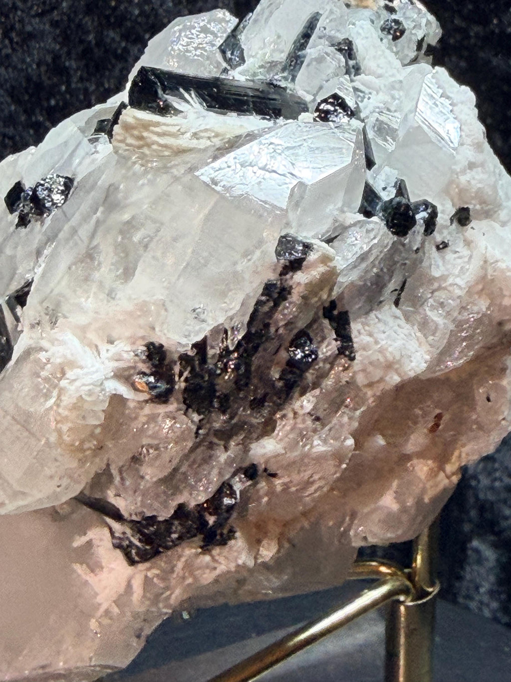 Blue and black tourmaline on quartz with calcite and Muscovite