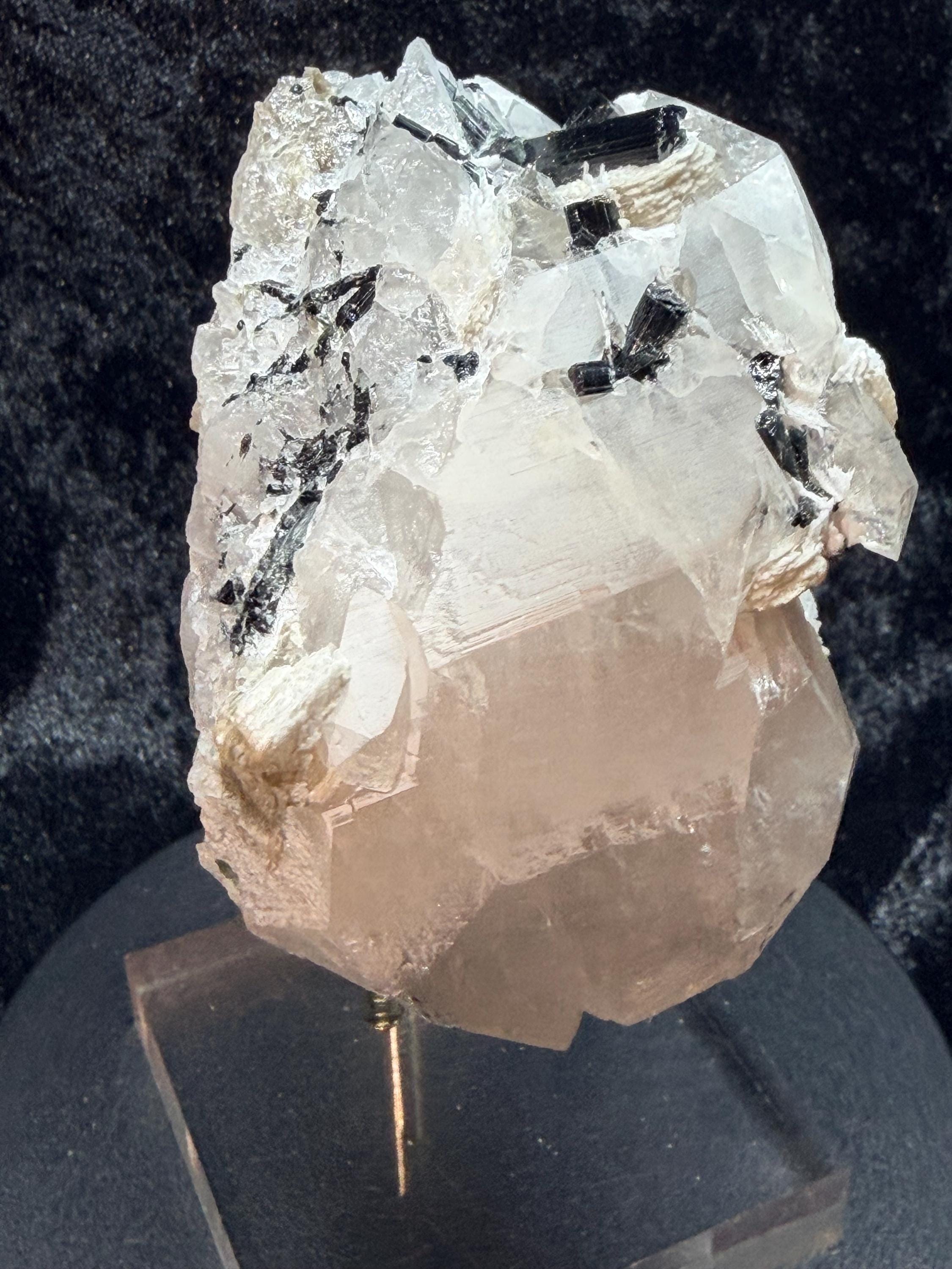 Blue and black tourmaline on quartz with calcite and Muscovite
