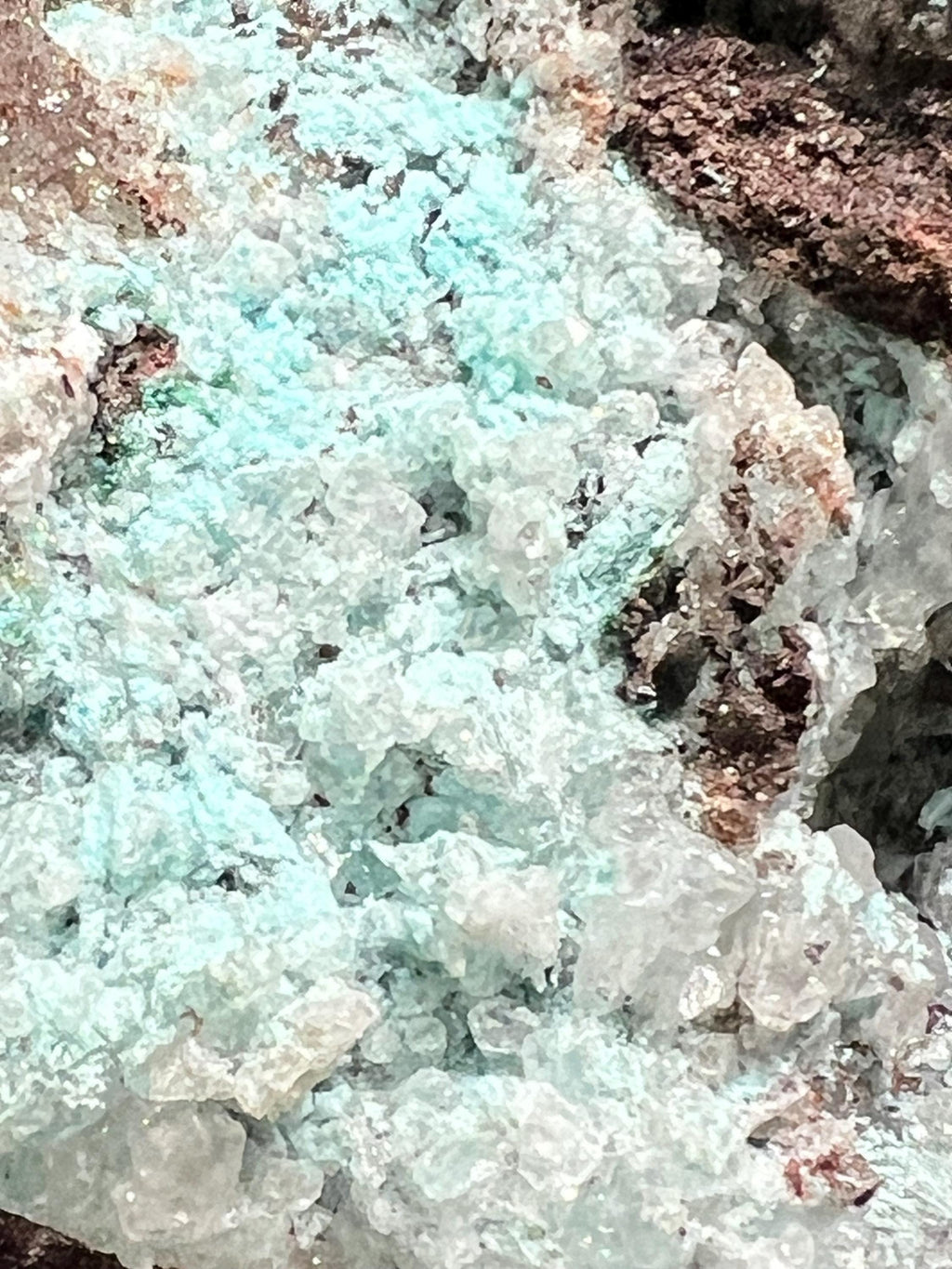 Aurichalcite with calcite and chrysacolla from Mexico.