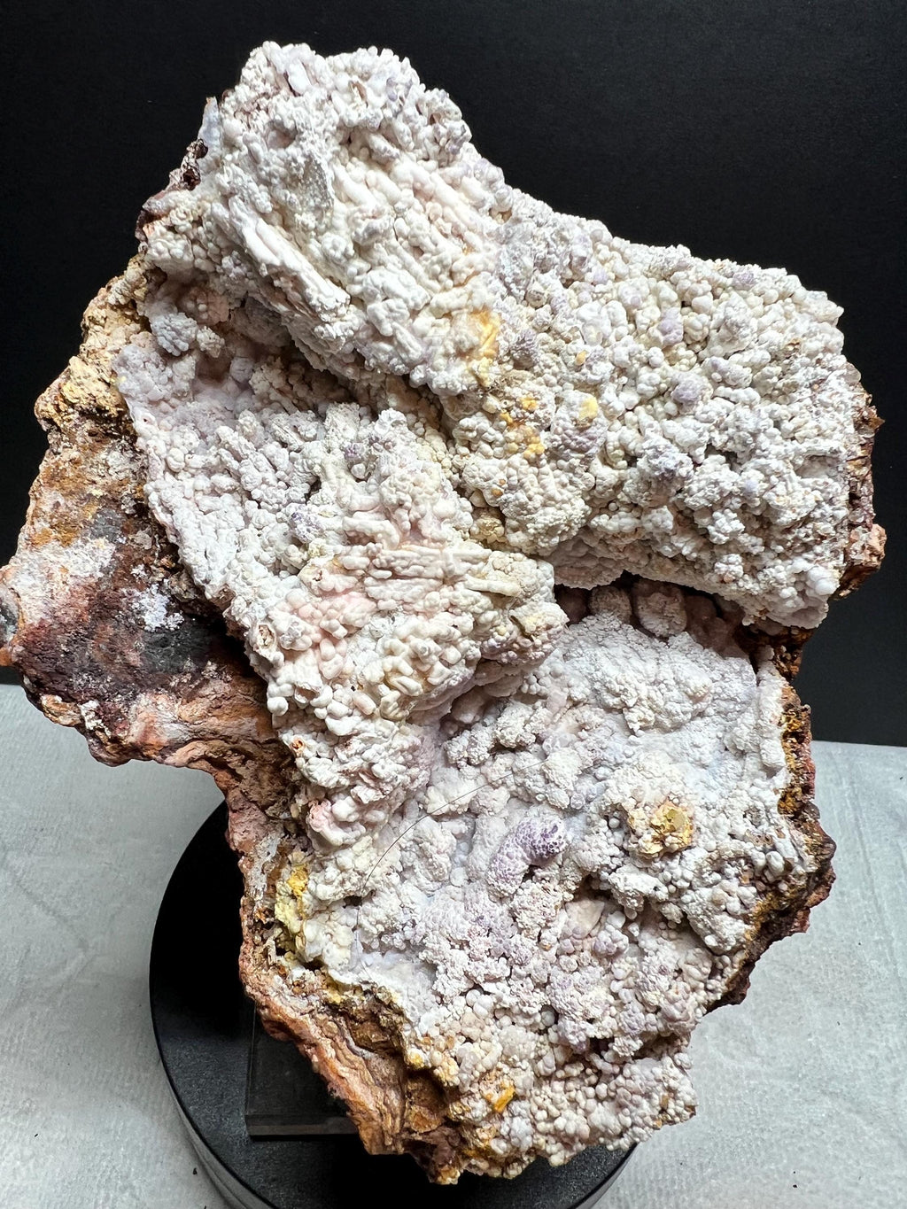 Araganite on Stalactite with purple Fluorite