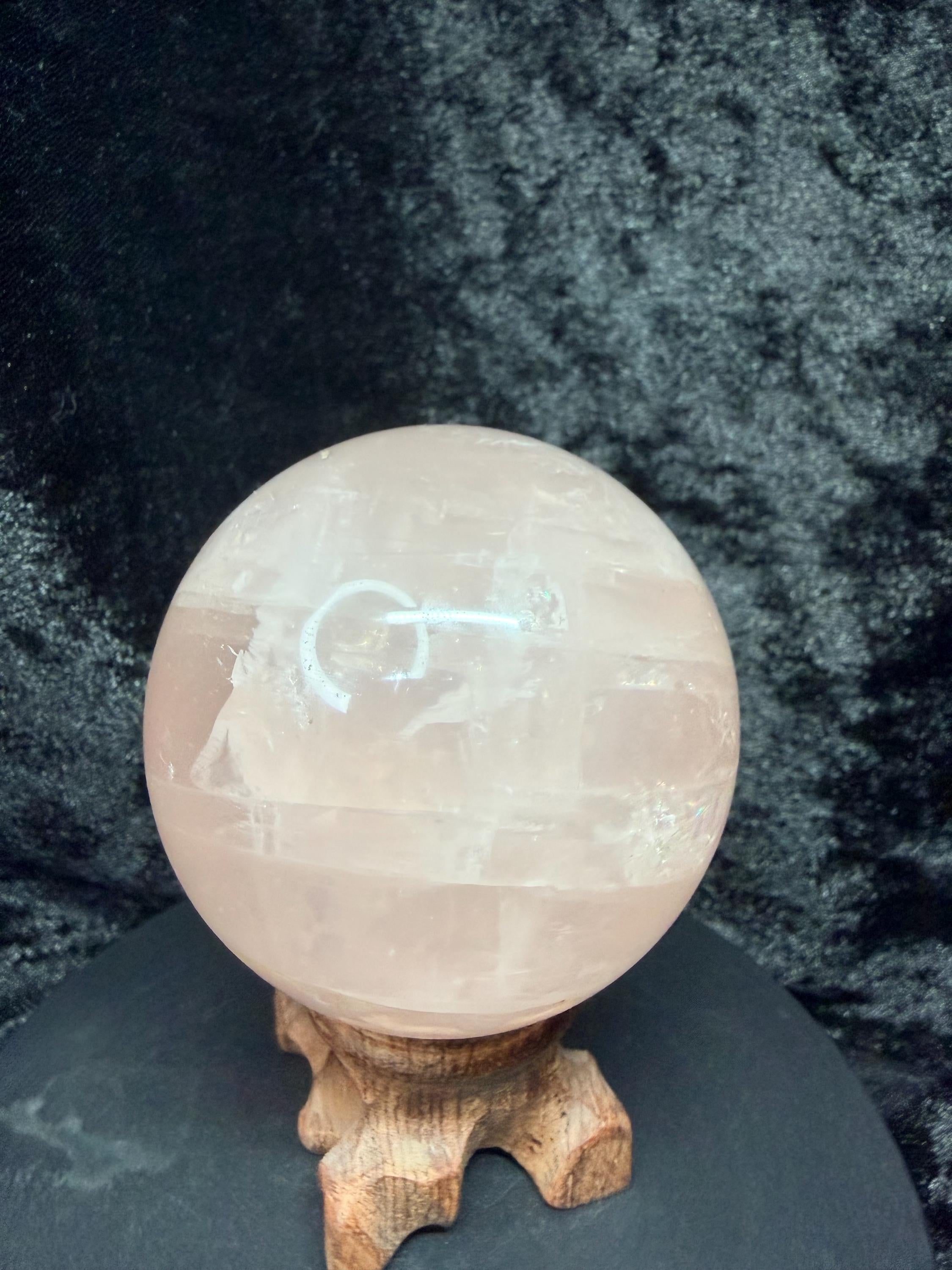 Stunning Rose Quartz Sphere with Vibrant Rainbow Flashes