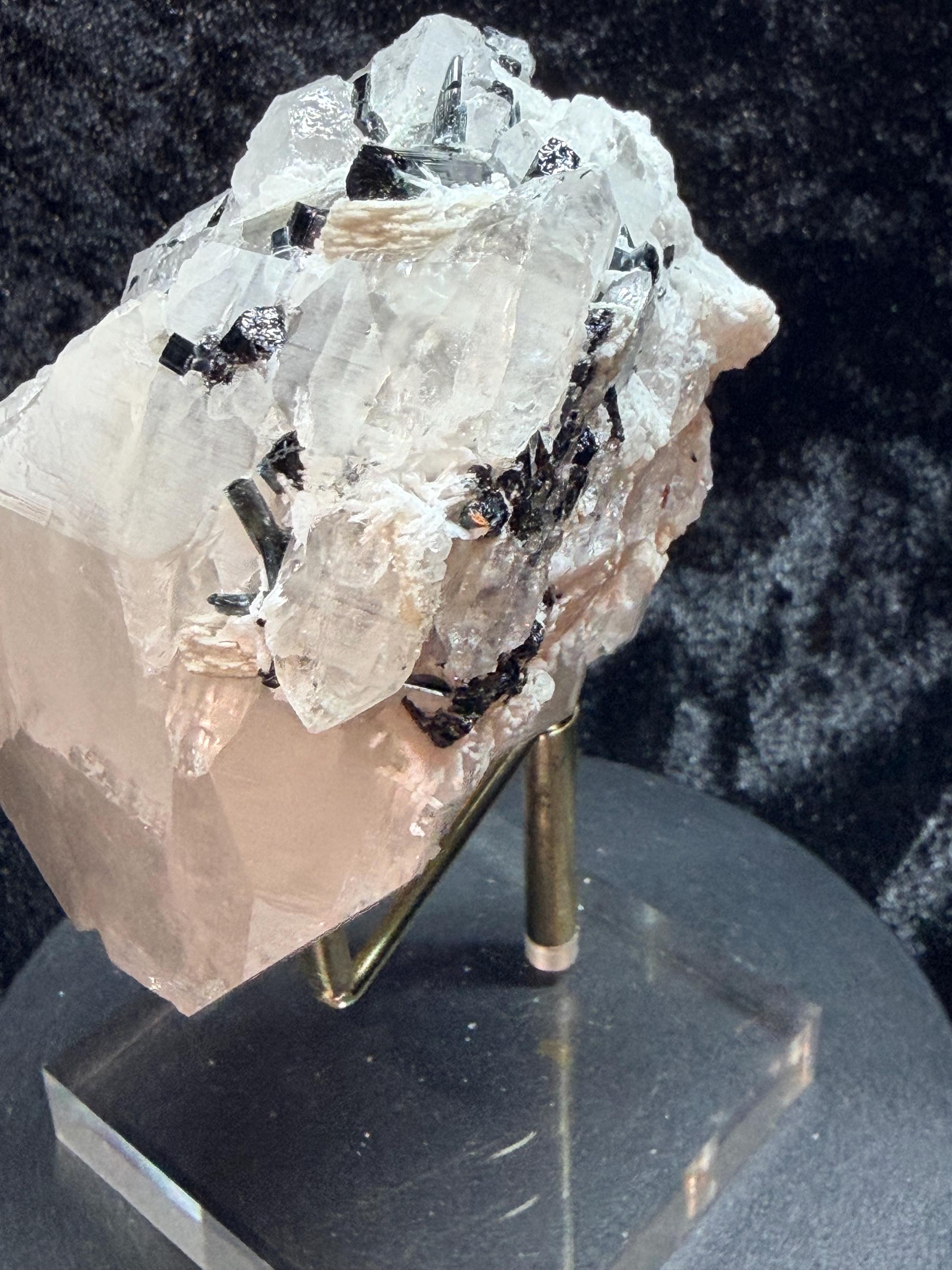 Blue and black tourmaline on quartz with calcite and Muscovite